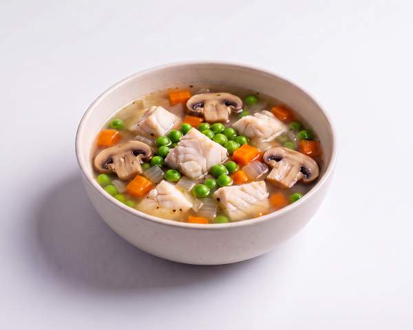Рыбный суп с зеленым горошком и шампиньонами